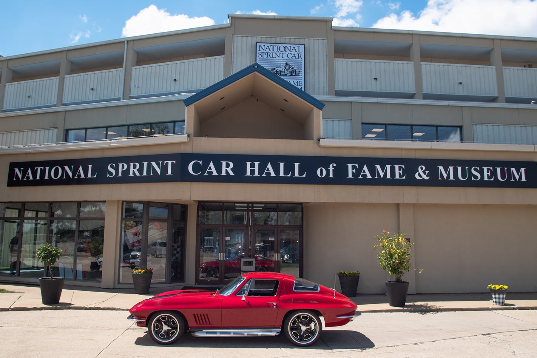 1967 Chevrolet Corvette ZZ502 parked outside the National Sprint Car Hall of Fame and Museum